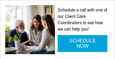 professional business female consulting with a senior and their daughter in the living room